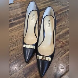 MICHAEL Michael Kors Black Leather Pointed-Toe Pumps with Gold Bow Accent